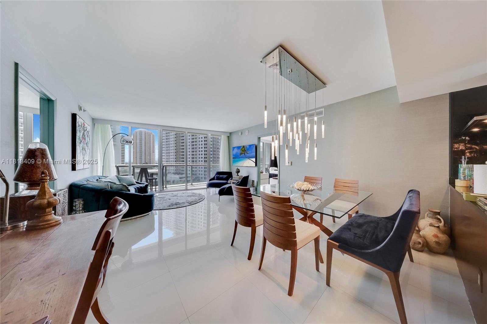 Experience elevated waterfront living in the heart of Brickell with this stunning 3-bedroom, 2-bath unit offering views of the Intracoastal, bay, and Port of Miami from every room. Wake up to breathtaking sunrises and unwind with serene water vistas from your private balcony. Designed with elegance and comfort in mind, this residence features an Italian-style gourmet kitchen with custom cabinetry, granite countertops, premium appliances, porcelain floors, and spa-inspired bathrooms. Fully furnished and move-in ready—bring your suitcase. Located in one of Brickell’s premier luxury buildings with world-class amenities including two resort-style pools, a state-of-the-art fitness center, and a welcoming pet-friendly policy. Don’t miss this opportunity to live the lifestyle at its finest.