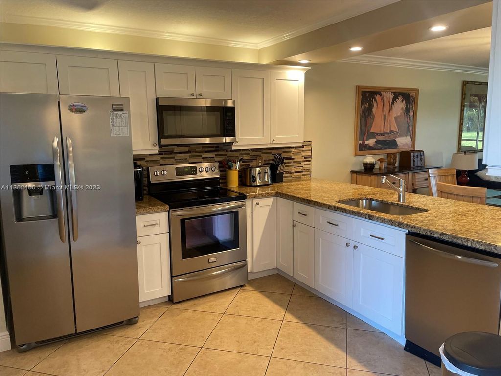 Photo of 275 Palm Ave #A103, Jupiter, FL 33477 (MLS # A11352455)