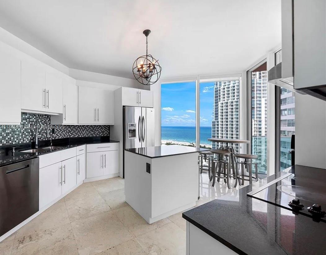 Unit 1901 at the prestigious Portofino Tower , A corner unit with breathtaking panoramic views This 2-bedroom + den, 2.5-bath residence boasts floor-to-ceiling windows, an expansive wraparound balcony.
A chef’s kitchen with top-of-the-line appliances, marble floors, a spacious primary suite with spa-inspired bathroom, and generous closet space. The additional den can function as a home office, or third sleeping area.
Located in the South of Fifth neighborhood, Portofino Tower offers luxury amenities including a 29th-floor fitness center with sauna and steam rooms, resort-style pool, tennis courts, valet, concierge, and 24-hour security.
Live steps from the ocean, South Pointe Park, fine dining, and the vibrant nightlife of South Beach. This is Miami Beach living at its finest.