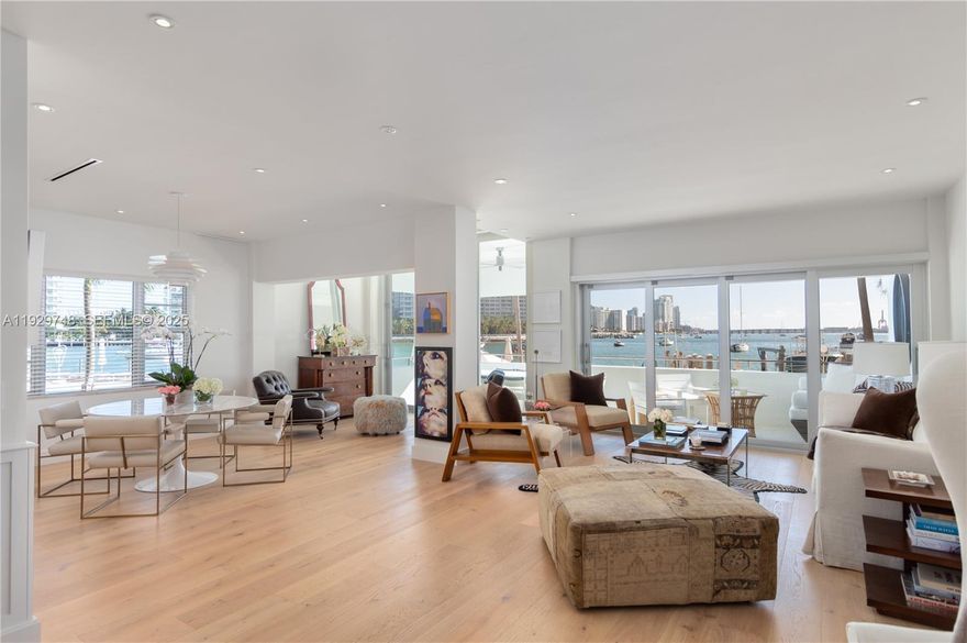 One of a kind, one in a million stunning house-like condominium. Direct and open bay and garden views from this ground level stand alone piece of paradise. No need for elevator, just walk into this beautiful condo and feel like you own a house. Unique open space with wide natural wood floors throughout and clear impact windows. Completely renovated and reconfigured with 2 bedrooms and 2.5 bathrooms. Bright and spacious. Enjoy the spectacular colors of the bay anytime of the day and boats going by.
Oversized laundry/pantry room. Pet friendly and dock available. Located in most desired mid-century landmark on Belle Isle.