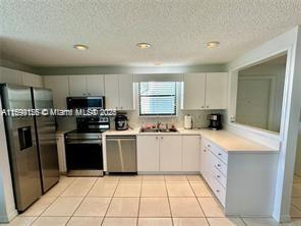 Photo of 6081 SE Landing Way #8, Stuart, FL 34997 (MLS # A11699156)
