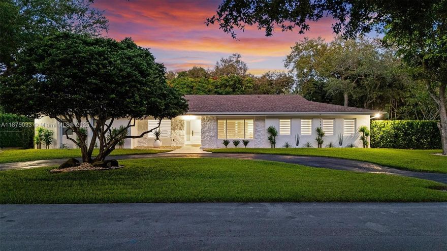 Recently renovated 4-bed, 3-bath estate on a lush half-acre in the heart of Pinecrest. Bright, open living spaces feature refined finishes and a versatile home office/den. A brand-new roof, impact-resistant windows, and fully lined plumbing provide lasting peace of mind. Natural light flows through spacious interiors designed for effortless indoor-outdoor living. Step outside to a resort-style pool, expansive patio, and manicured gardens ideal for entertaining. A stately circular driveway and attached two-car garage complete this turnkey retreat where timeless design meets modern comfort.