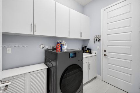 Tiny photo for 10566 N Lago Vista Cir, Parkland, FL 33076 (MLS # A12026891)