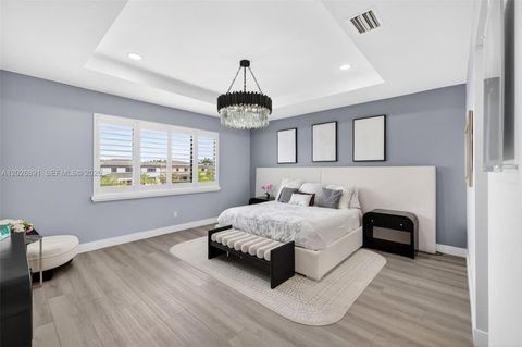 Tiny photo for 10566 N Lago Vista Cir, Parkland, FL 33076 (MLS # A12026891)