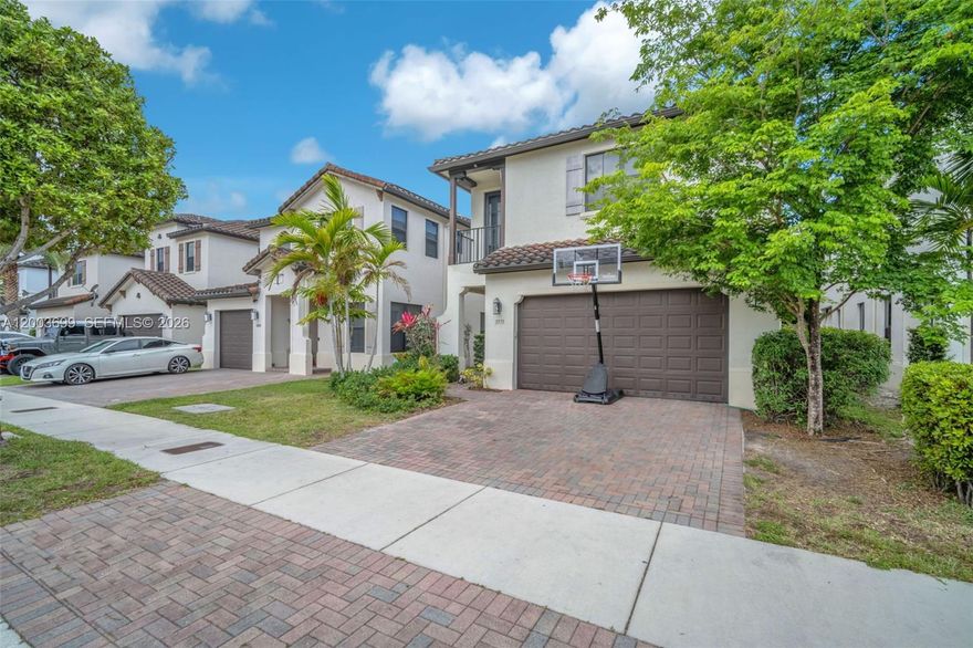 Stunning 5 bedroom, 3 bath home plus versatile LOFT offering nearly 3,000 SF in the sought after gated community of Bonterra! Built in 2016 with hurricane impact windows and doors throughout, soaring high ceilings, 2 car garage, and brick paver driveway. The beautifully renovated gourmet kitchen features quartz countertops, wood cabinetry, stainless steel appliances, and a massive island with ample seating, perfect for entertaining. A convenient downstairs bedroom with a full bath next to it is ideal for guests or multi-generational living. Upstairs offers the primary suite, additional bedrooms, upstairs laundry for everyday ease, and a spacious loft perfect as a home office, playroom, or media room. Resort style amenities include the Grand Clubhouse with fitness center, pool, tennis and basketball courts, playgrounds, walking trails, and a scenic 15-acre lake and all with 24-hour gated security. Zoned for A-rated Bob Graham Education Center (K-8), one of Miami Lakes' top schools. Minutes to I-75, Florida's Turnpike, Palmetto, shopping, dining, and the upcoming American Dream Mall. A rare opportunity in one of Hialeah's premier communities!