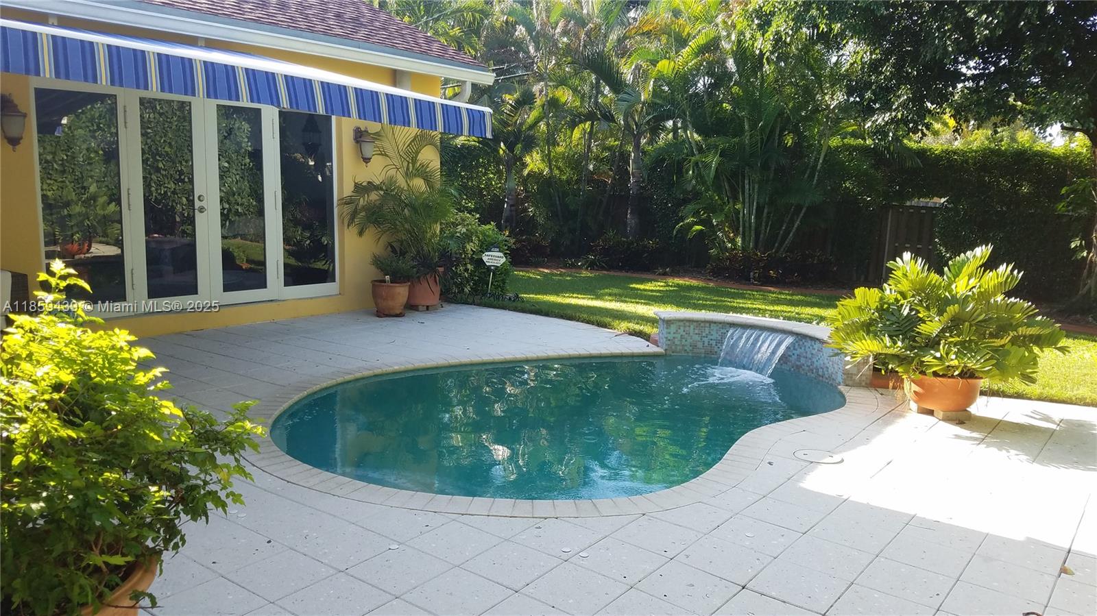Welcome to this amazing 3-bedroom, 2-bath POOL home with a versatile den/office and a 1-car garage. The spacious primary suite is an add on addition, boasting a fabulous closet and generous layout. Enjoy soaring vaulted ceilings throughout the living, family, and dining areas, with double doors that open to a covered patio and sparkling pool—perfect for indoor-outdoor living. Step outside to your oversized tiki hut, ideal for entertaining, all within a fully fenced backyard. This home blends comfort, charm, and Florida-style fun!