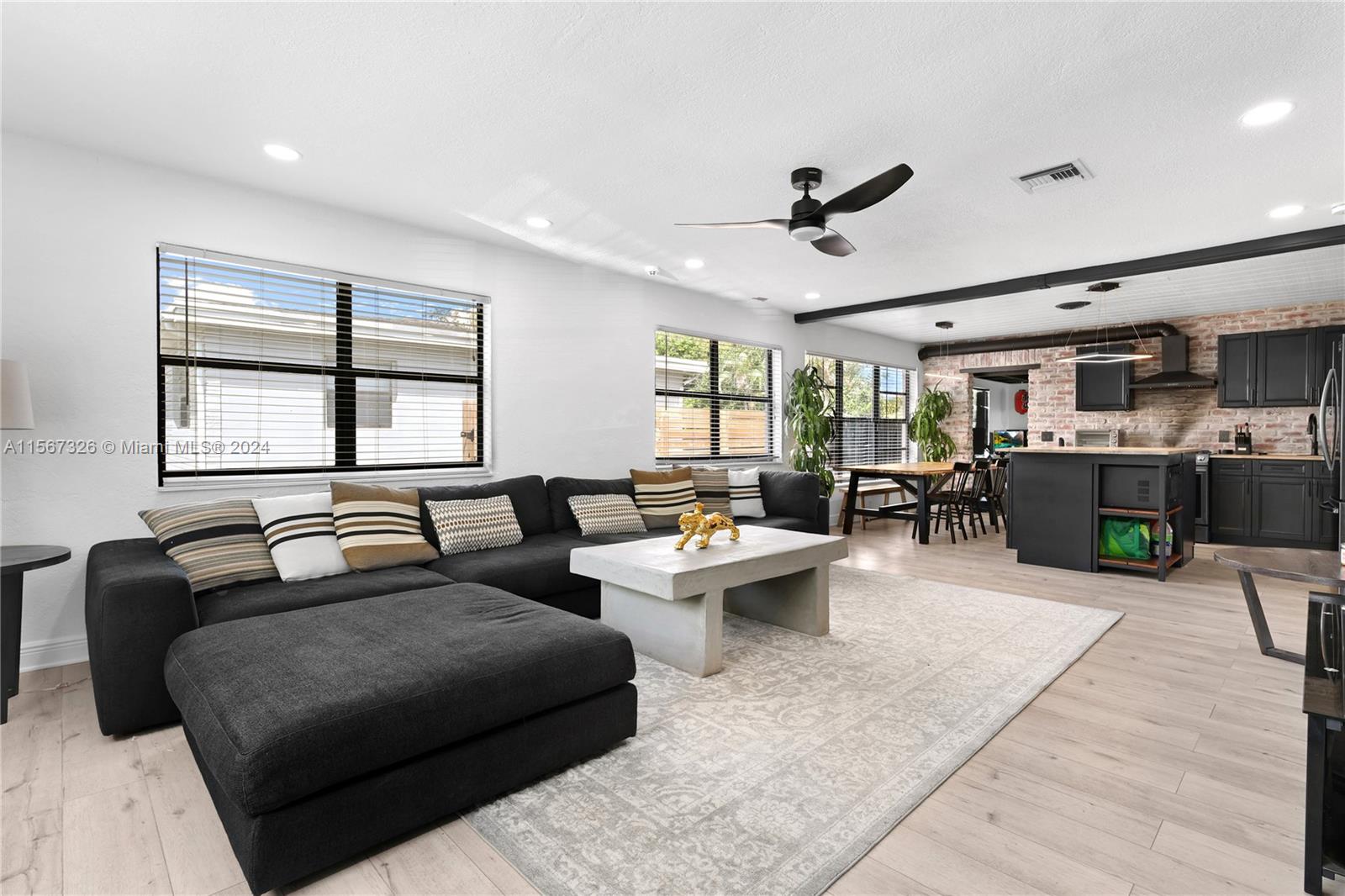 THIS TOTALLY UPDATED HOME WITH 4 BEDROOMS, 2 BATHROOMS, 1 DEN & NO HOA IS AN INVESTOR'S DREAM HOME. THIS HOME FEATURES PLENTY OF PARKING SPACE FOR A BOAT OR RV. THE PRIVATE BACKYARD HAS ROOM FOR A POOL & ENTERTAINMENT. PLUS IT COMES WITH A FULL SIZE STORAGE SHED, SOLAR PANELS,  NEW ROOF, NEW AC AND NEW ECO SMART TANK-LESS WATER HEATER PLUS SOLAR PANELS. THE 4TH BEDROOM IS LOCATED ON A 2ND FLOOR NEAR THE DEN WITH A PRIVATE DOOR THAT LEADS TO THE BACKYARD THAT CAN EASILY BECOME AN APT. THE SPACIOUS RUSTIC INDUSTRIAL KITCHEN WITH NEW APPLIANCES & OPEN CONCEPT GIVE THIS HOME THAT SPECIAL LOOK HARD TO FIND OUT THERE. IN ADDITION THIS HOME SITS IN A LARGE LOT ACROSS THE STREET FROM A CALM PARK & MINUTES AWAY FROM SHOPPING, DINING & HIGHWAYS. LOOK AT THE VIRTUAL TOUR & REQUEST A SHOWING