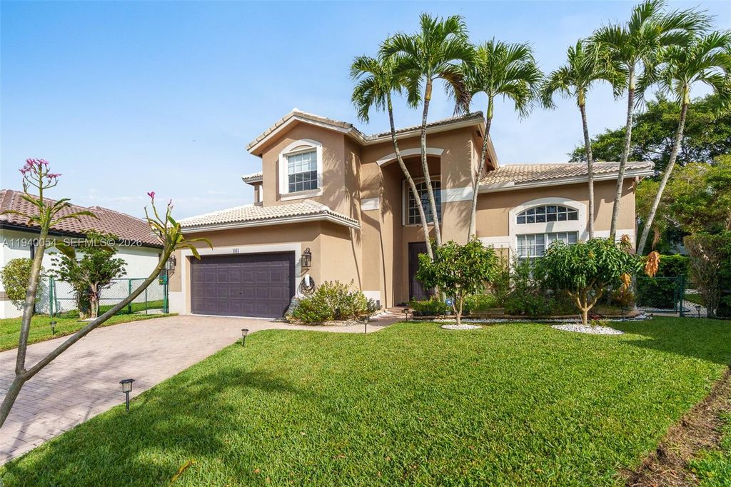 Photo of 4963 NW 58th Ave, Coral Springs, FL 33067 (MLS # A11940054)