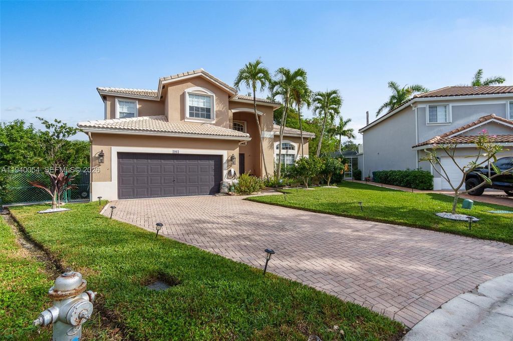 Photo of 4963 NW 58th Ave, Coral Springs, FL 33067 (MLS # A11940054)