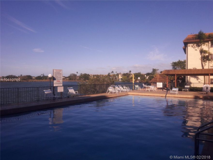 Stunning completely remodeled spacious 2 beds/2 bath unit. Porcelain & wood new floors, newly upgraded bathrooms and kitchen with beautiful off-white cabinets and beige granite counter tops. Huge walk-in closet and plenty of closet spaces. Large newly tiled balcony, screened in-balcony. Utility room with a full size washer & dryer. Great amenities: gym, club house, two pools with beautiful lake view. 24 hrs security. Secured gate and elevator entrance. Just minutes away from Aventura Mall,  Shops & Restaurants. Close I-95& T/P.