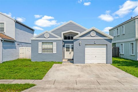 Photo of 9917 W Elm Ln, Miramar, FL 33025 (MLS # A11892839)