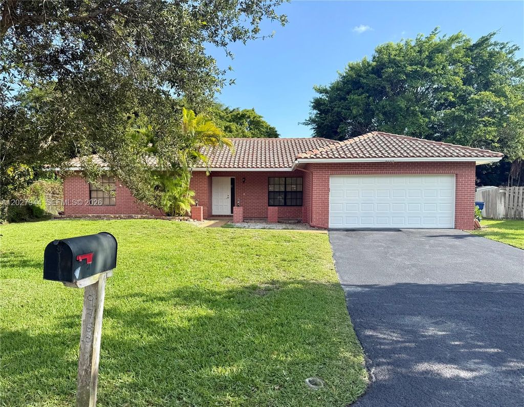 Photo of 9788 NW 3rd Mnr, Coral Springs, FL 33071 (MLS # A12027944)