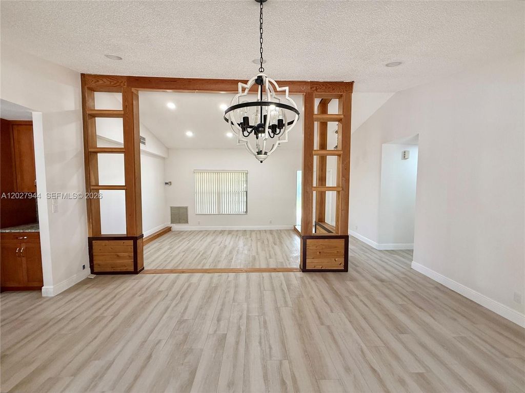Photo of 9788 NW 3rd Mnr, Coral Springs, FL 33071 (MLS # A12027944)