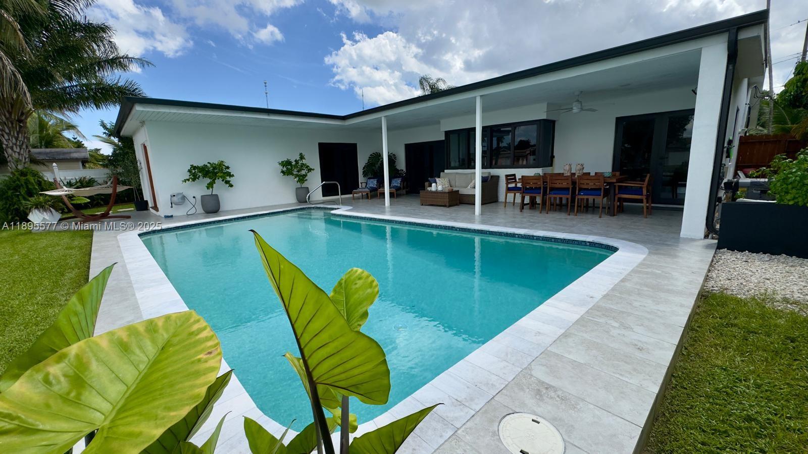 Welcome to this beautifully renovated water/lakefront property in Miramar! This 3-bedrooms, 2-baths home sits on a spacious 8000 sq ft lot. This modern property recently remodeled features a beautiful kitchen with quartz countertop and new stainless steel appliances, sleek recessed LED lighting, and a new roof (2022) for added value and peace of mind. The pool in the backyard has been recently updated and you can enjoy a peaceful water views, perfect for relaxing or entertaining. Additional features include a huge driveway (2024), New A/C and new hot water tank, impact windows and garage door (Complete Impact protection). Whether you’re looking for a new place to call home this property is ready for you!