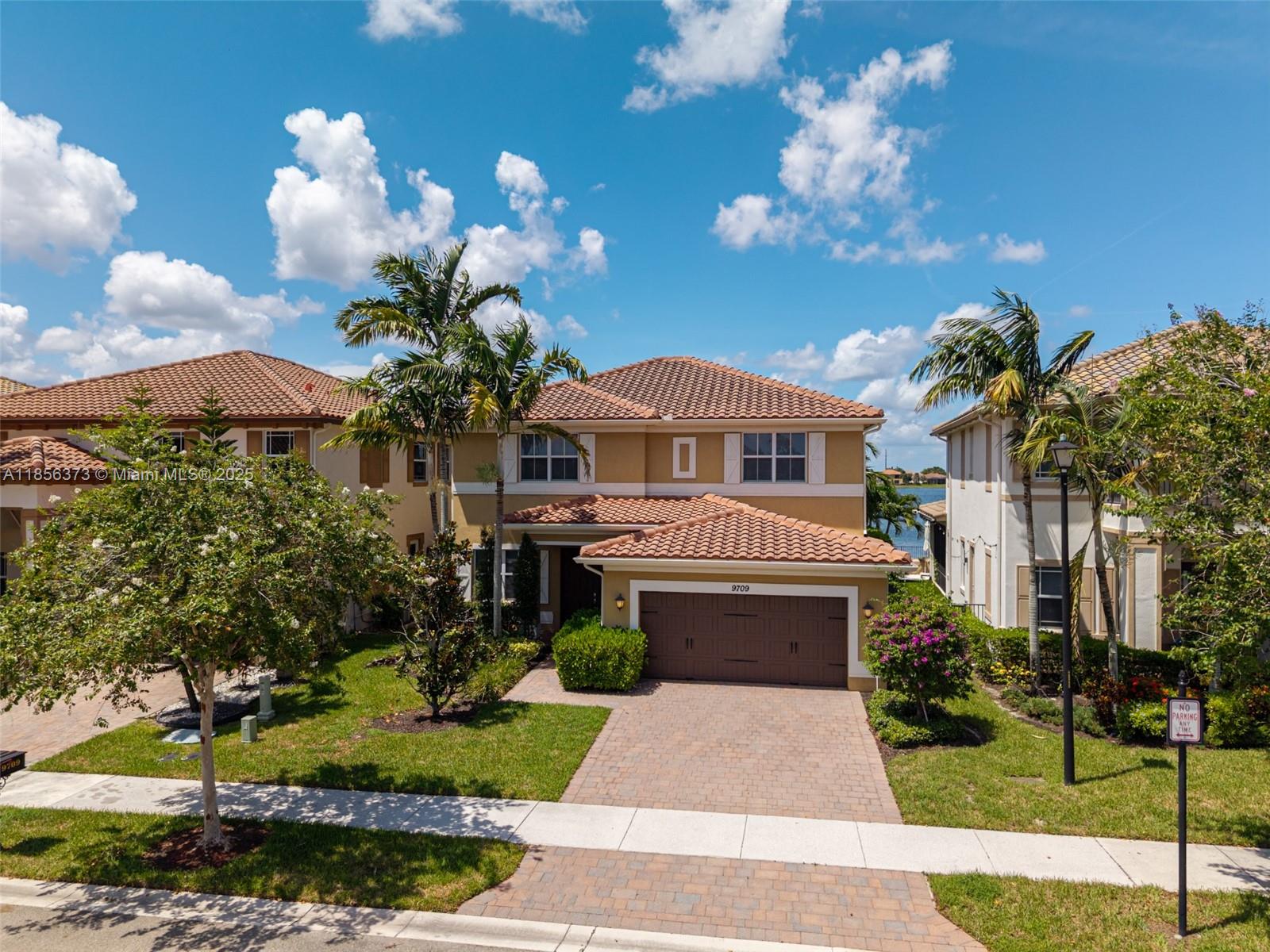 Step into elegance in the prestigious gated enclave of Miralago, Parkland. This exquisite residence offers resort-style living with a grand clubhouse and serene lake views. The designer heated pool invites you to unwind or host unforgettable gatherings under the Florida sun. Curated by Steven G Interiors, the home showcases impact windows and doors, sleek granite finishes, a cabana bath, and a spacious two-car garage. With four bedrooms and four bathrooms, including a lavish master suite with walk-in closets and spa-like ambiance, every corner is crafted for comfort and privacy. Best of all, this Turn Key home comes fully furnished with impeccable style! Experience refined living in one of South Florida’s most desirable communities—where luxury meets lifestyle.