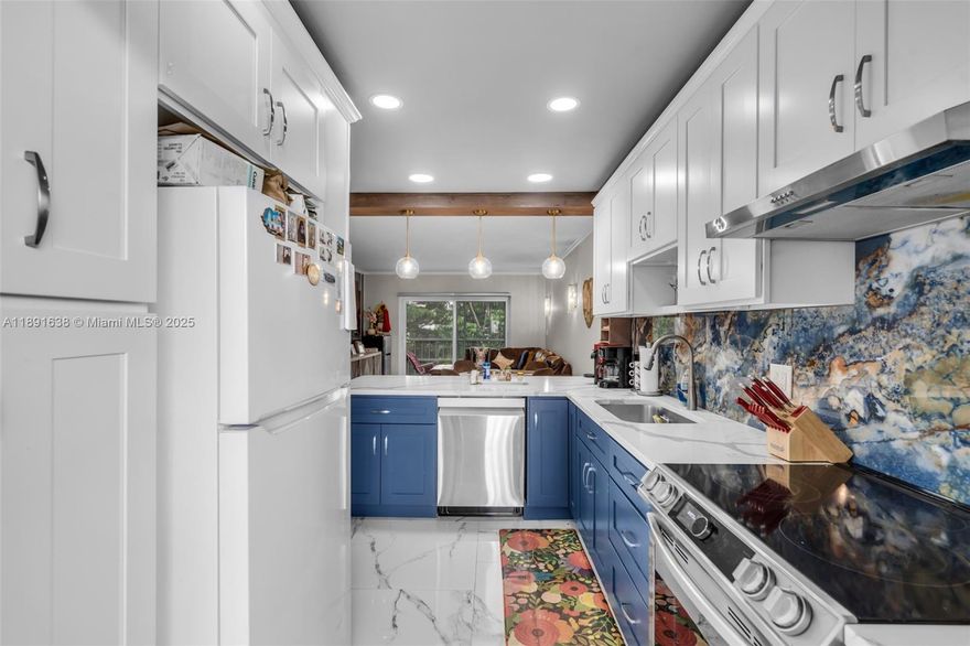 Beautifully updated oversized deluxe 1-bedroom residence in the desirable Hillcrest community. Enjoy serene views of a 4-mile nature trail surrounded by lakes, tropical birds, and lush greenery. The open-concept kitchen features modern cabinetry and countertops. The bathroom offers a timeless, elegant design. Unit includes one assigned parking space. Rentals permitted only with board approval, ensuring very few rentals and a quiet, well-maintained community. This community is 55 and older.