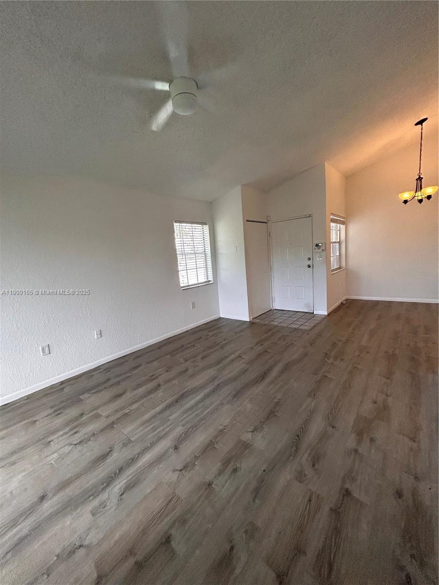 Panoramic water views of the lake and canal surround this spacious second-floor 2-bedroom, 2-bath unit with vaulted ceilings. Enjoy exceptional privacy, vaulted ceilings, and the convenience of an in-unit washer and dryer. The lushly landscaped community features BBQ and picnic areas, a fitness center, three pools, two hot tubs, a billiards room, an electric vehicle (EV) charging station, and nightly roving security.