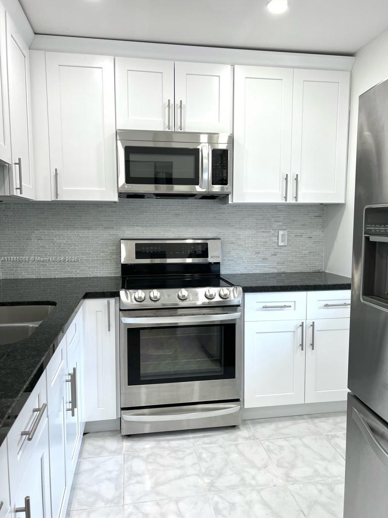 ELM GARDENS CONDO - Residential Lease