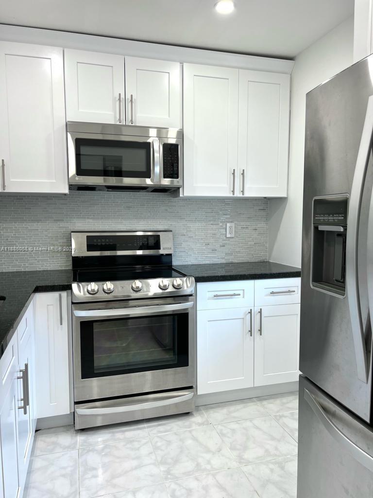 ELM GARDENS CONDO - Residential Lease