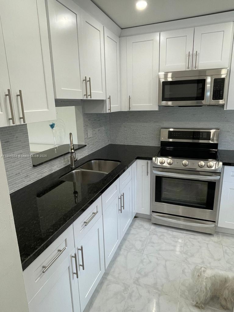 ELM GARDENS CONDO - Residential Lease