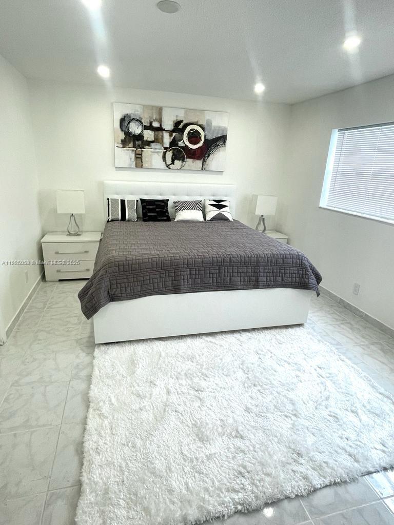 ELM GARDENS CONDO - Residential Lease