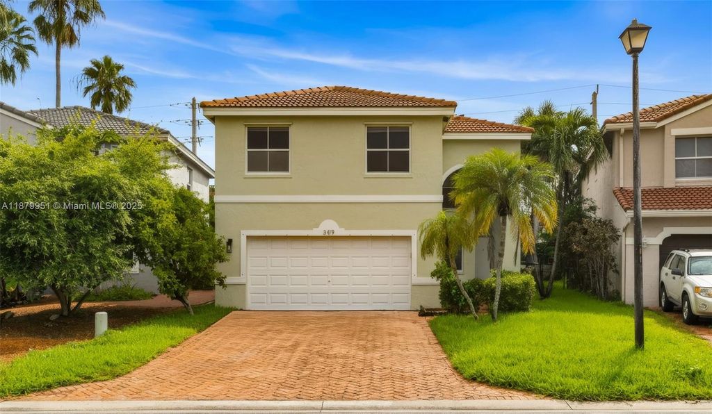 Photo of 3419 NW 110th Ter, Coral Springs, FL 33065 (MLS # A11879951)