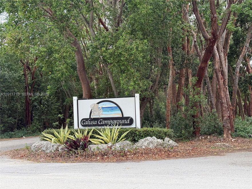 Spacious 1750 sq ft lot in desirable Calusa Campground, Key Largo. Discover your slice of paradise in the highly sought- after community. Fully set up for comfort, relaxing and convenience. Property features a well maintained trailer that sleeps up to 10, paver and tiled surfaces throughout, covered carport/patio ideal for outdoor living and utility shed for extra storage.  Enjoy resort style amenities: boat launch, golf-cart friendly streets, swimming pool, clubhouse, laundry facility, tennis, basketball, children’s playground, picnic area and beautiful bay front Sunsets. Lot is rentable for short-or long term stays. The perfect Key's retreat or income-producing property