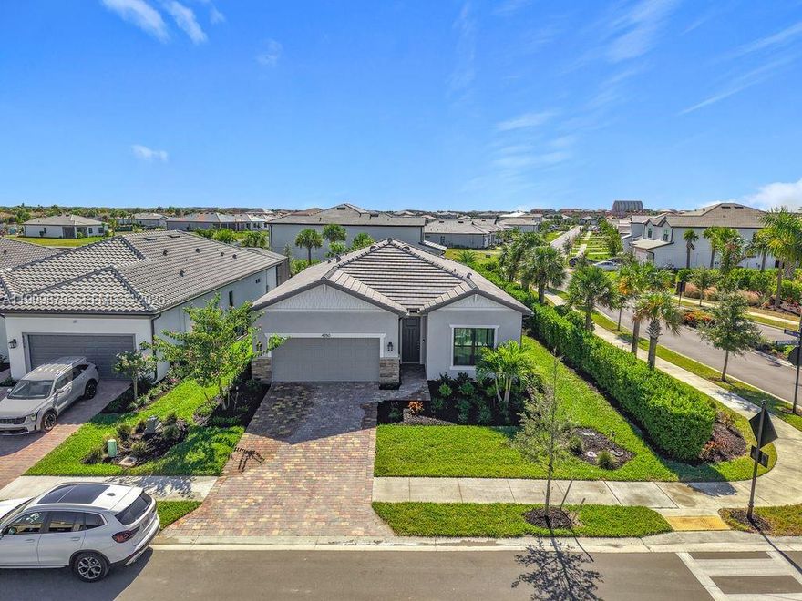 Move to Avalon Park! This beautiful Cedar floorplan on a corner lot features aluminum fencing, outdoor lighting, epoxy floor in garage, kitchen configuration with walk-in pantry, walk-in closet in the primary bedroom, extended covered lanai, tile in living areas and carpet in the bedrooms, quartz countertops, and more! Parks are throughout the neighborhood. Ave Maria North Park offers sand volleyball courts, soccer and baseball fields, basketball courts, a playground, and shaded picnic pavilions. The Ave Maria Water Park features a beach-entry resort pool, fitness lap lanes, waterslides, and a splash zone for kids. Ave Maria South Park includes a dog park, softball fields, bocce and pickleball courts, and scenic walking and biking trails. Pending probate court approval of terms