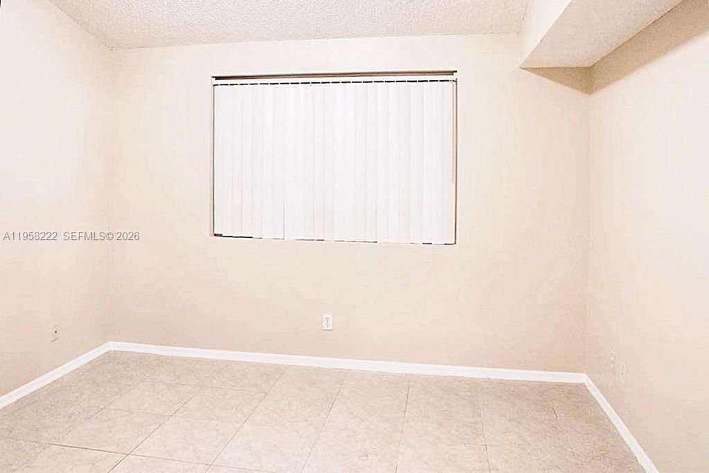 Photo of 9909 Westwood Dr #35-1, Tamarac, FL 33321 (MLS # A11958222)
