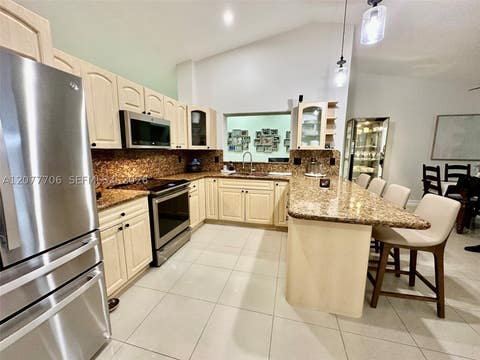 Tiny photo for 9021 NW 150th Ter, Miami Lakes, FL 33018 (MLS # A12077706)