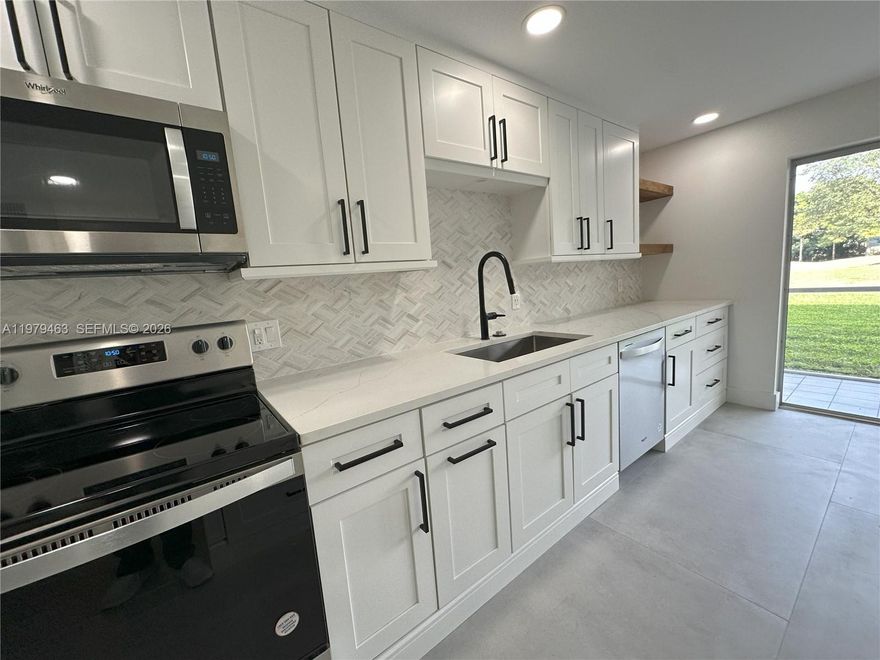 Step into a beautifully reimagined residence where modern elegance meets effortless comfort. This fully renovated home shines from the moment you walk in — bright, pristine, and thoughtfully designed with today’s buyer in mind.

The stunning contemporary kitchen is the heart of the home, featuring sleek high-gloss white cabinetry, luxurious quartz countertops, and a clean, sophisticated aesthetic that feels both timeless and on-trend. Every detail throughout has been carefully updated with refined finishes and a cohesive design palette.

The spacious living area offers flexibility and flow — perfect for relaxing or entertaining — while still providing the convenience of a dedicated utility room with a full-size washer and dryer.

Beyond your front door, an extraordinary lifestyle awaits. Enjoy resort-style amenities including sparkling pools, a state-of-the-art fitness center, club rooms, social activities, and live performances. in a spectacular 1,000-seat theater. Whether you’re seeking vibrant social engagement or peaceful, elegant surroundings, you’ll find it here.

Attractively priced and truly move-in ready, this is your opportunity to enjoy effortless living in a beautifully updated home.

Come see why this one feels different the moment you walk in.