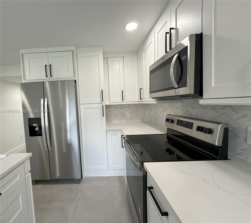 Photo of 9470 Tangerine Pl #109, Davie, FL 33324 (MLS # A11979463)