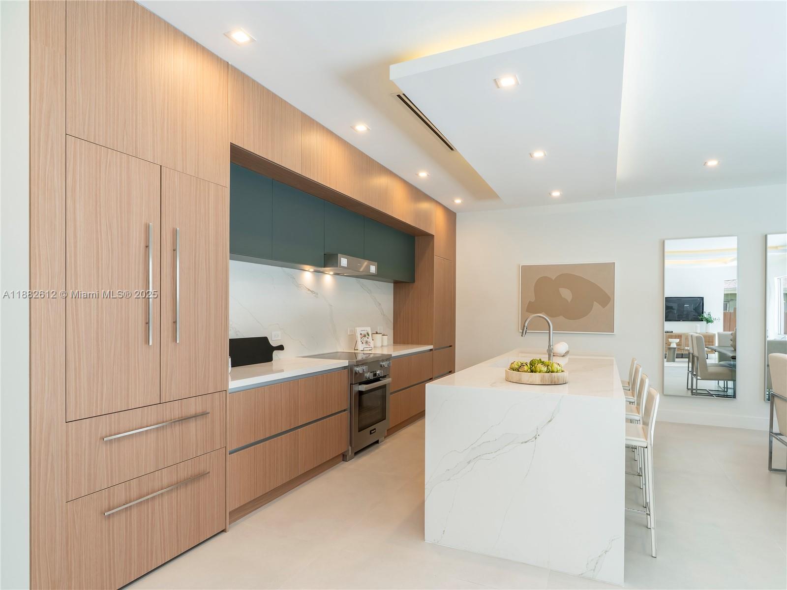 Presenting The Villas at Victoria Park — A distinguished new residence completed in 2025, offering nearly 3,000 square feet of luxury. This elegant home features Four spacious bedrooms plus Den, four full bathrooms, and soaring ceilings throughout. Appointed with premium Miele appliances, a bespoke wine bar, and high-end finishes, every detail reflects exceptional craftsmanship. A private backyard with a serene swimming pool and a two-car garage completes this rare offering in one of the area’s most prestigious neighborhoods. Located directly across the street from Holiday Park which is listed as one of the best parks in south Florida with its tennis courts, pickleball, basketball, ice hockey rink and walking trails etc.