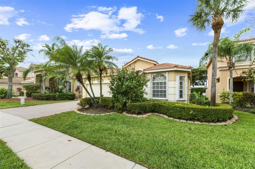 This is a beautiful 3 BR and 2Bath located at the prestigious community of ISOLA Bella. This home features Accordion shutters, high Ceiling lot of closets, automatic garage door, dishwasher, microwave, electric range, refrigerator. laundry tub, washer ,dryer, ceiling fans central cooling, ceramic tiles in living, kitchen and Florida room and laminate floor in all bed rooms.