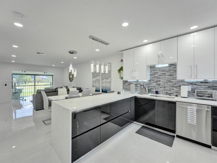 Completely remodeled in 2022 . 2 bedrooms, 2 full bathrooms. Furniture is included in the sale. Contemporary open kitchen with granite countertops. Stainless steel appliances. Full size washer & dryer in bathroom. Plantation shutters in both bedrooms and kitchen. Glass enclosed patio with golf course view. Move in ready designer condo with No mandatory Membership required. New Roof in 2020. AC 2019 (Rheem 2.5 tons) Water heater 2022 (Rheem)Boca Lago is an active 55+ community. Non-mandatory club membership is available. Boca Lago is a non-equity club that offers all the benefits and prestige of a golf and country club lifestyle without excessive initiation fee