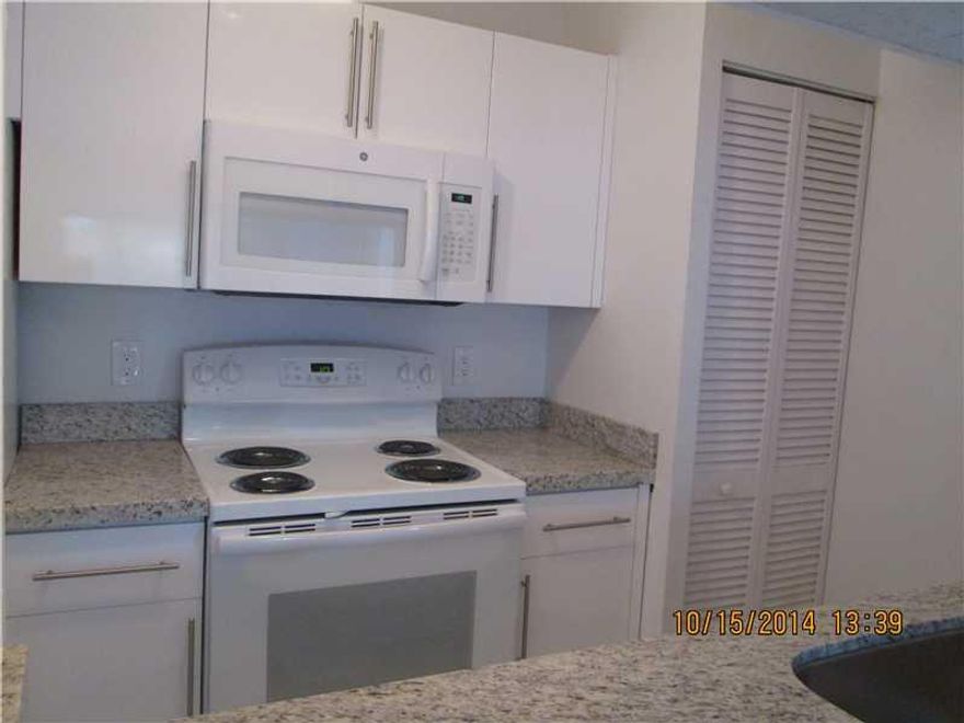 Impeccable 3 Bed/ 2 Bath Condo. New Kitchen Cabinets and New  Appliances, Remodeled Bathrooms. Great location at The Hammocks in Kendall.