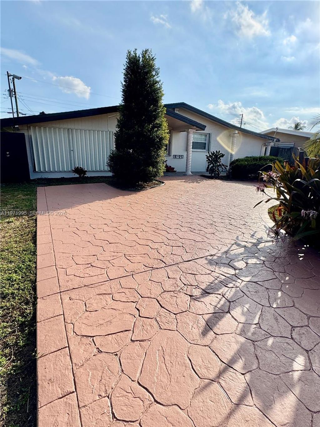 Photo of 7910 NW 12th St, Pembroke Pines, FL 33024 (MLS # A11971995)