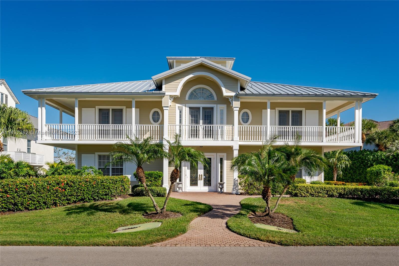 Nestled within the prestigious Hideaway Beach Community an enclave of luxury, this exceptional two-story home defines resort style living in a secluded paradise. The prime location on the 9-hole golf course offers not just a home but an exclusive lifestyle featuring amenities such as a 9 clay tennis courts, 2 bocce courts, 2 pickleball courts, 3 restaurants and over 2 miles of white sand beach. With 4 bedrooms, 4 bathrooms, an elevator, and a 3-car garage. This residence seamlessly blends convenience with sophistication. Ascend the staircase to discover bonus rooms that add versatility to the spacious interiors. The home's design is a perfect fusion of functionally. What truly sets this property apart the breathtaking view it affords. Overlooking holes 4,5,6 & 7 of the gold course