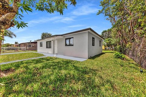 Photo of 3381 NW 210th Ter, Miami Gardens, FL 33056 (MLS # A11889524)