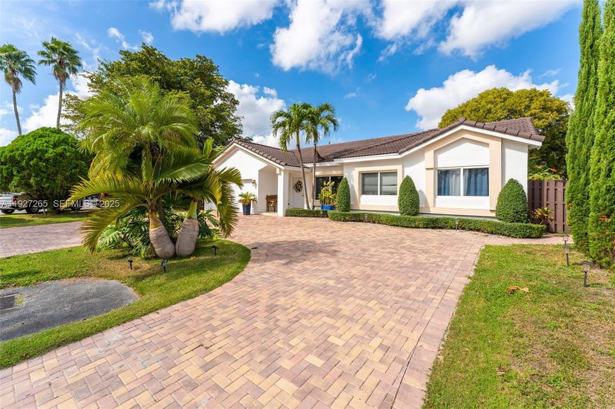 Beautiful and well-kept single-family home in the highly desirable West Kendall area featuring bright and spacious living areas, an open layout, and tile flooring throughout. The kitchen offers ample cabinet space and overlooks the family room, perfect for everyday living and entertaining. Generously sized bedrooms and updated bathrooms provide comfort, while additional highlights include a newer roof, high-impact windows, and a driveway accommodating up to nine cars. The private backyard is ideal for gatherings, outdoor dining, or relaxation, and the property is conveniently located near excellent schools, shopping, restaurants, and major highways.