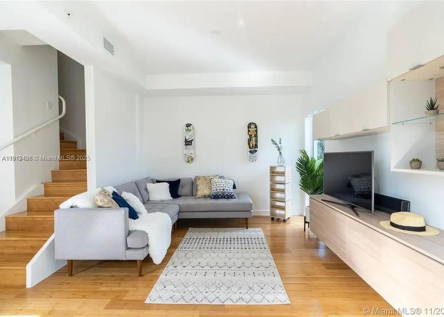 Bright and spacious 2-story corner townhome in the heart of South Beach, just one block from the iconic South of Fifth neighborhood and a short walk to the beach. Features include an open kitchen, half bath downstairs, and two upstairs bedrooms with en-suite baths and large walk-in closets. Impact windows and doors, blackout shades, Bosch appliances, hardwood floors, and custom California Closets built-ins throughout. Building completed in 2016; unit in pristine condition. Gated, well-maintained complex with 1 covered parking space, 2 guest spots, and in-unit washer/dryer. Zoned for South Pointe Elementary.