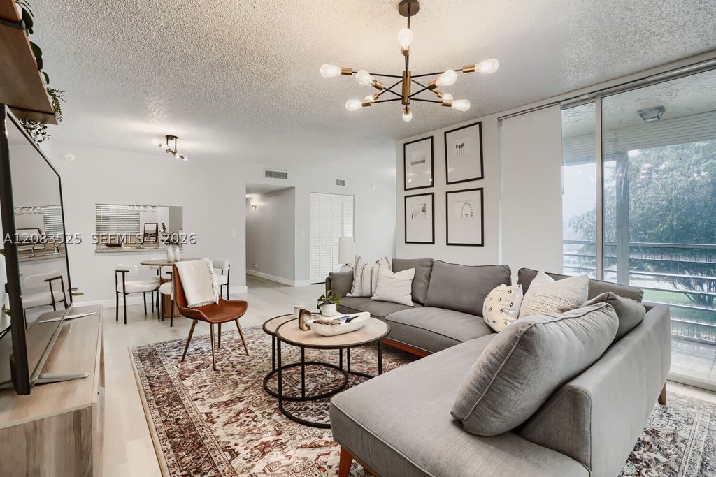 Photo of 9311 Orange Grove Dr #316, Davie, FL 33324 (MLS # A12083525)