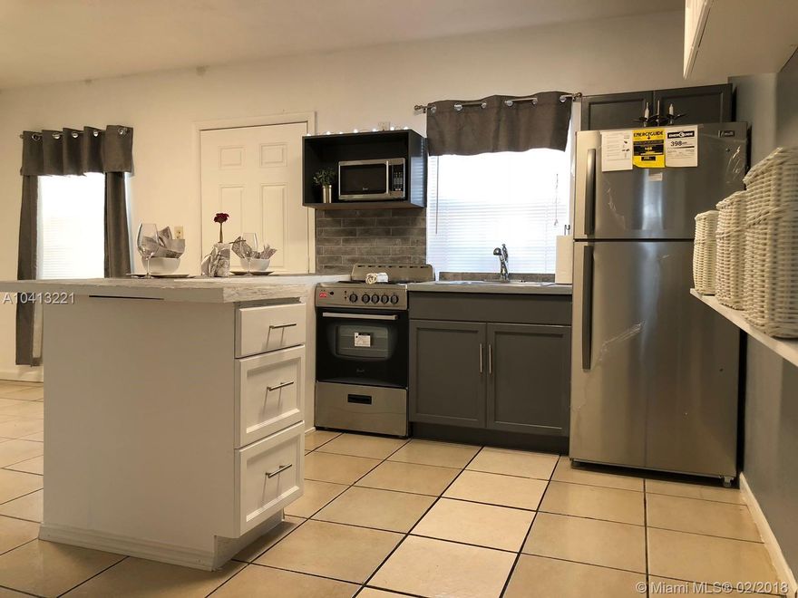 Nice house with living areas that have plenty of natural light. Three bedrooms & one bathroom. Nice professional front & back landscaping & ample parking area. New stainless & steel kitchen appliances, completely renovated kitchen, freshly painted, central A/C, new doors, laundry room, washer & dryer. Nice backyard perfect for play, gardening or just relaxing on a weekend.