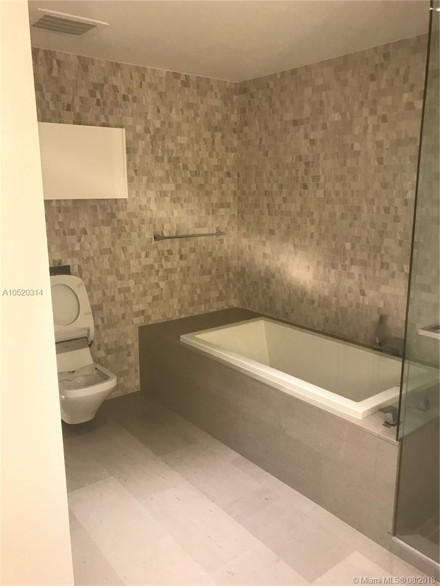 REACH CONDO - Residential Lease