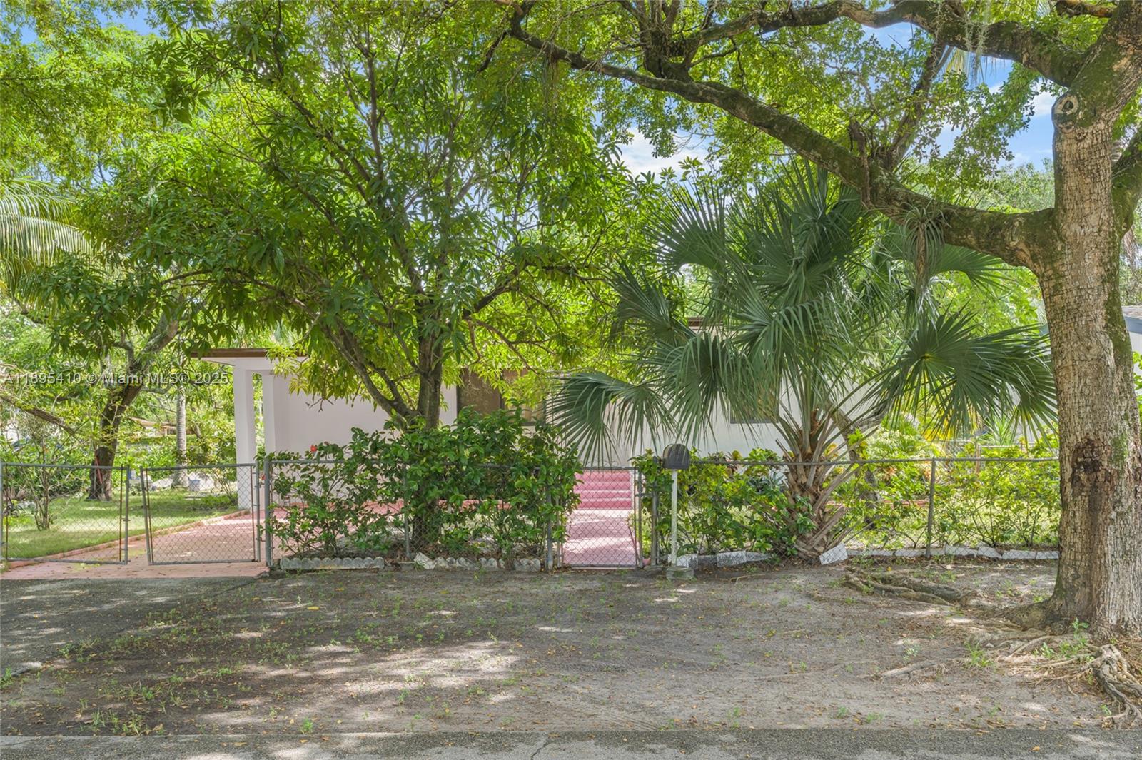 Comfort & convenience in this quiet North Miami home. Single-story w/ peace of mind: new roof, new A/C, & hurricane impact windows. Open-concept living/dining/kitchen. Main home has 2 beds, 1 bath, plus large separate in-law quarters (192 sq ft) w/ private entry and its own bath—perfect for guests or a home office. Also features a large utility/storage room (120 sq ft).
Outdoors, a 7,538 sq ft lot w/ fully fenced yard. Enjoy 3 outdoor spaces: screened porch (96 sq ft), covered patio (144 sq ft), & front porch (52 sq ft). Large driveway.
Centrally located: Mins to I-95, 15 mins to beach, moments to Barry University, shopping, & NoMi Village. Incredible opportunity for a first-time buyer or savvy investor.