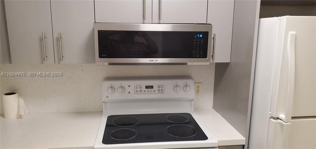 Photo of 400 SW 134th Way #102F, Pembroke Pines, FL 33027 (MLS # A12084478)