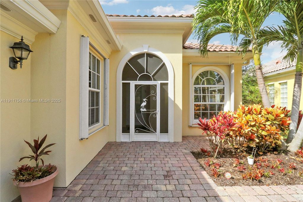 Photo of 4909 Grassleaf Dr, Palm Beach Gardens, FL 33418 (MLS # A11911756)