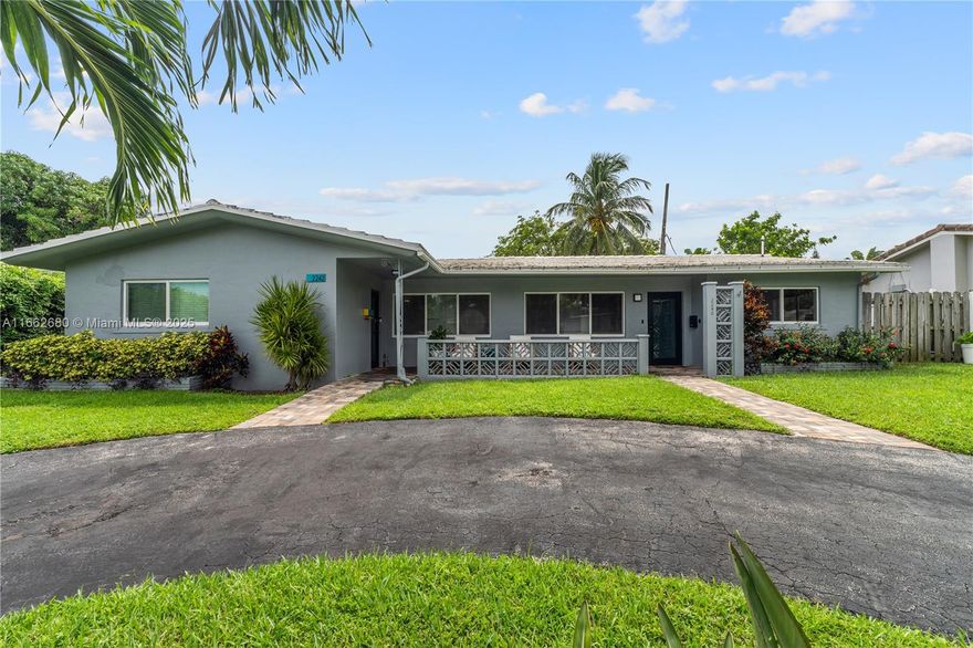 IMPACT WINDOWS THROUGHOUT!!!  NEW A/C!!! NEW KITCHEN!! Don't miss out on this opportunity to own in Lighthouse Point at an affordable price point.  Great location within walking distance to restaurants and shopping.  Golf cart friendly neighborhood.  No HOA or condo fees!  Completely remodeled 2/2 half duplex with fully fenced in yard (left side of house)(right side is also available separately).  New modern kitchen with high end appliances.  Updated bathrooms and flooring.  Huge Florida room could easily be used as a 3rd bedroom, office or den.  Cast iron plumbing replaced. Huge backyard patio that can be used for entertaining or for additional parking (3 spaces adjacent to back alley).  Great potential for short term rentals or AirBnB.  Excellent investment opportunity!