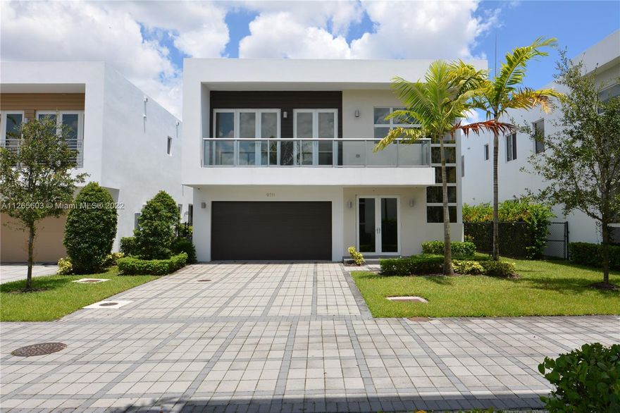 Amazing lakefront view with private pool single family in Modern Doral 45 with 5 bedrooms and  4 full bathrooms . 1 bedroom and full bathroom downstairs, open floor with great kitchen with Italian wood cabinetry, Bosch appliances and quartz countertops with a wine cooler. Spacious living room and dining room area with high ceilings. Wooden stairs and floor throughout second floor partially furnished by Artefacto. Impact windows with blinds blackout. Laundry room upstairs with whirlpool washer and dryer. Enjoy Patio with lake view private pool with outdoor barbecue equipped with sink and refrigerator outside. Gorgeous clubhouse with gym, spa, children playroom and more.Rent included basic cable internet and alarm