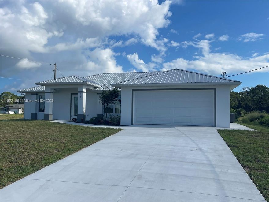 This extraordinary custom built 3 bedroom/2 bath home showcases any number of designer-inspired features which include upgraded floor tile (24" x 24") throughout, vaulted ceilings, ceiling fans and gorgeous modern lighting fixtures. Striking accents walls - contemporary in design - can be found in both the living room and master bedroom. The spacious kitchen, which adjoins the comfortable living and dining area, has an oversized 8' flowing island with a built-in wine cooler, an abundance of cabinets with beautiful granite counter tops and soft-close drawers as well as a modern stainless steel appliance package and a handy pantry. A large walk-in closet and well-appointed ensuite - with a fully tiled shower and vanity - complete the layout for the comfortable master bedroom.